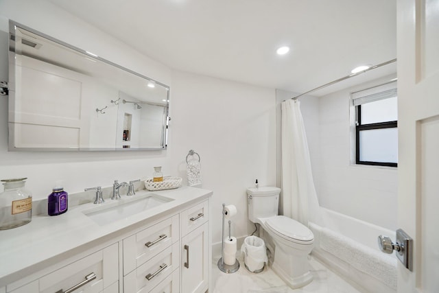 full bathroom with vanity, toilet, and shower / bath combo with shower curtain