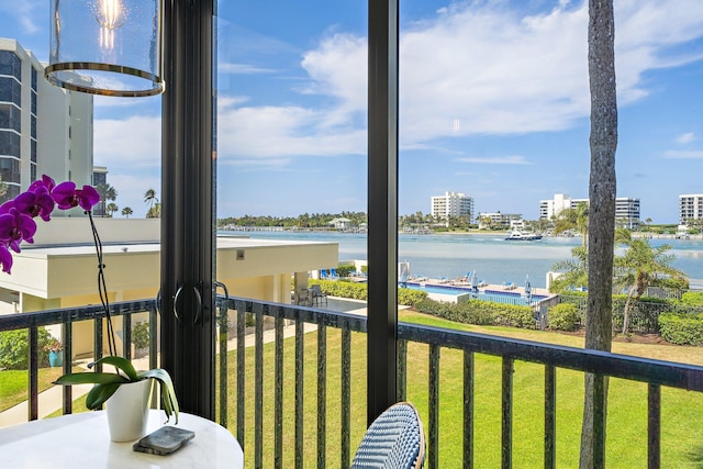 sunroom with a water view