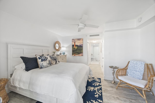 bedroom featuring hardwood / wood-style floors and ceiling fan