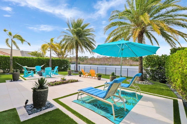 view of pool with a lawn and a patio area