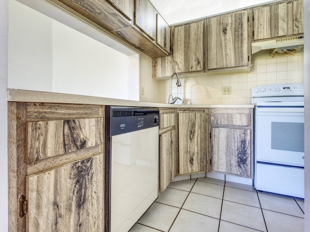 kitchen featuring decorative backsplash, white appliances, light tile patterned floors, range hood, and sink