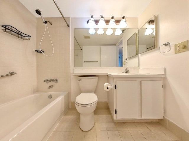 full bathroom featuring tiled shower / bath combo, tile patterned flooring, vanity, and toilet