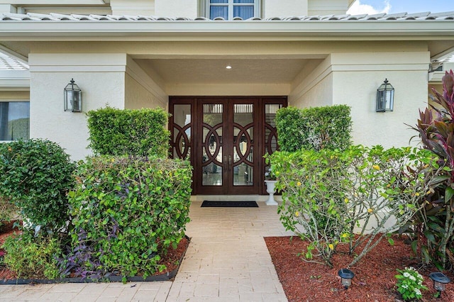 doorway to property with french doors