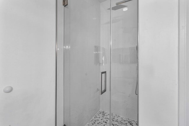 bathroom with an enclosed shower