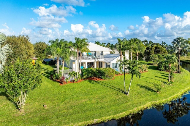 drone / aerial view with a water view