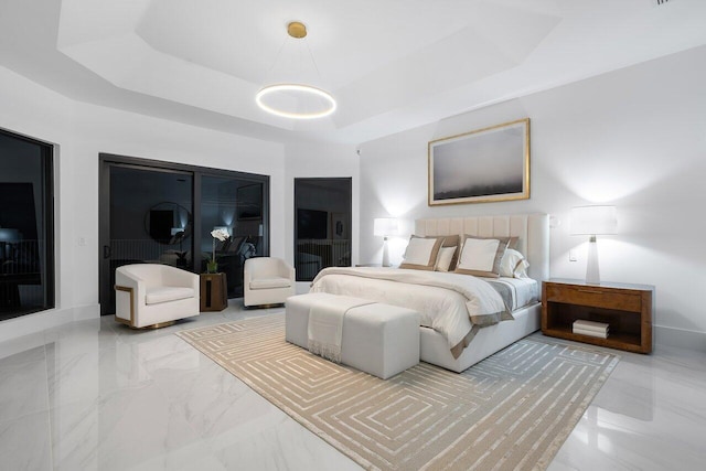 bedroom featuring a tray ceiling