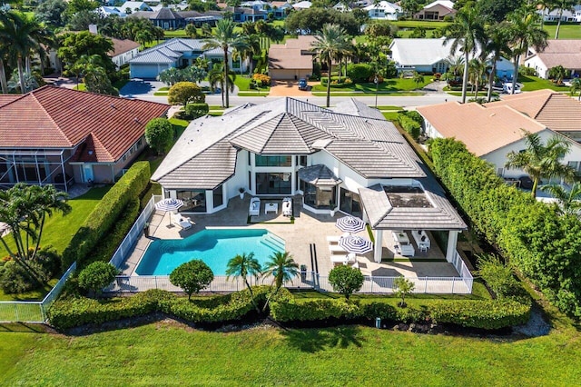 view of swimming pool with a lawn and a patio