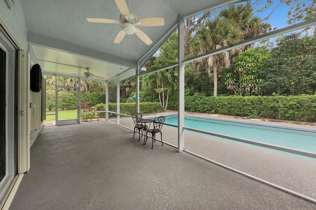 view of pool featuring ceiling fan and a patio area