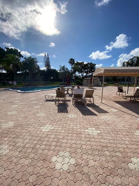 exterior space featuring a community pool