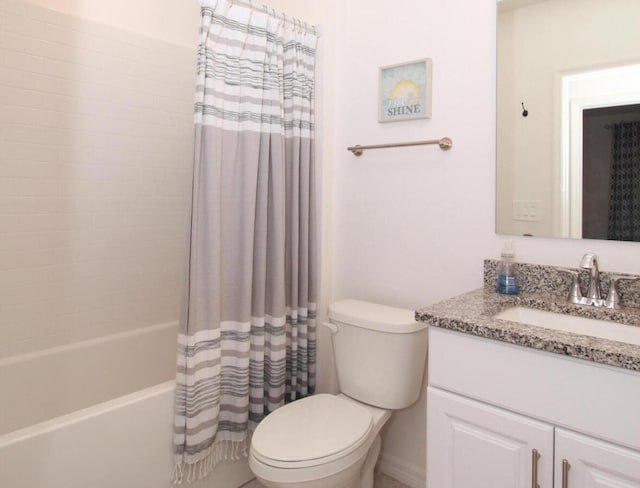 full bathroom featuring shower / tub combo, vanity, and toilet