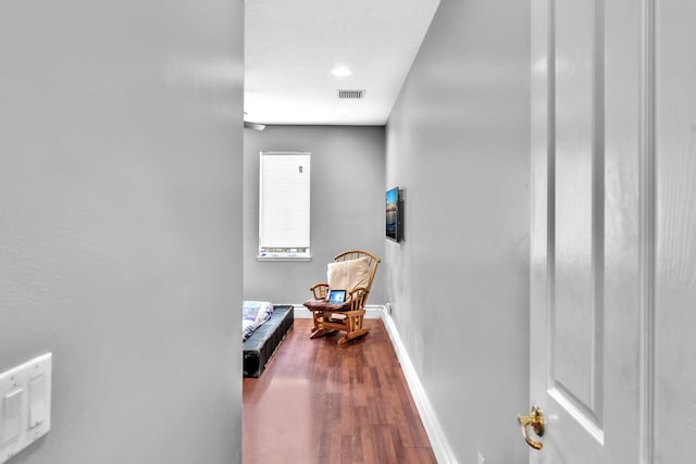 hallway featuring hardwood / wood-style flooring