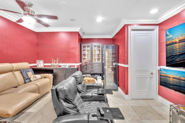 living room featuring ceiling fan and ornamental molding