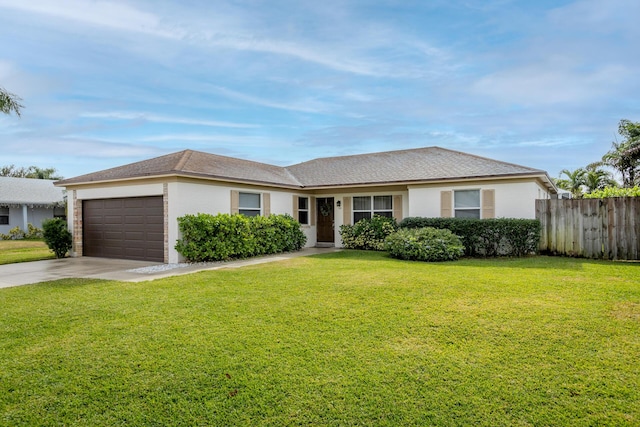 ranch-style home with a front yard and a garage