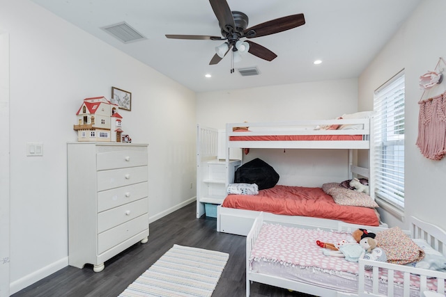 bedroom featuring dark hardwood / wood-style floors and ceiling fan