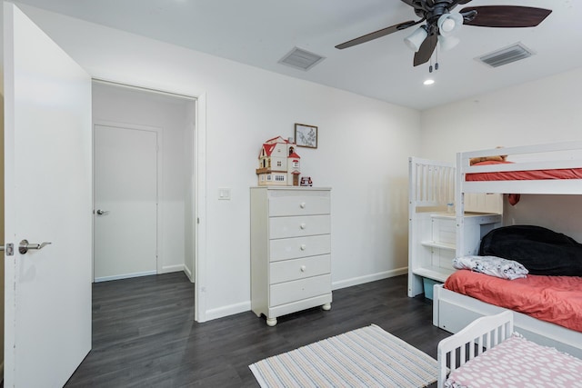 bedroom featuring ceiling fan and dark wood-type flooring