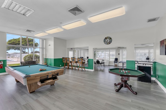 recreation room with billiards and light hardwood / wood-style floors