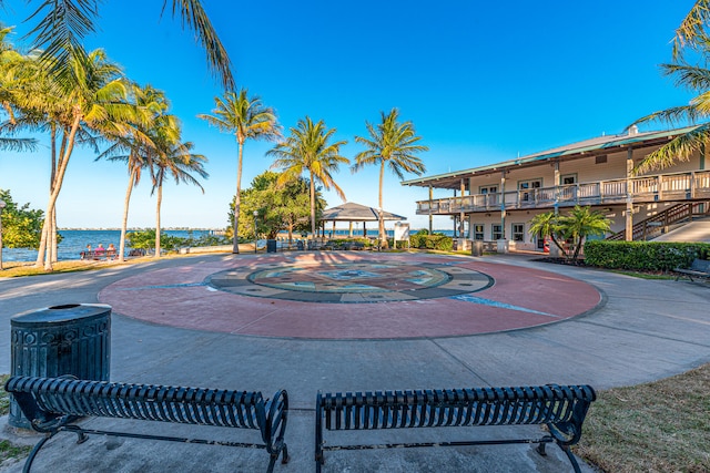 surrounding community featuring a water view