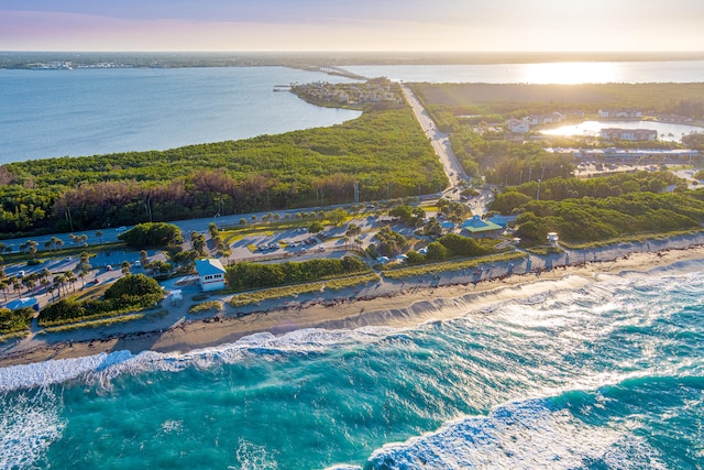 aerial view at dusk with a water view