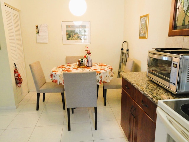 view of tiled dining space