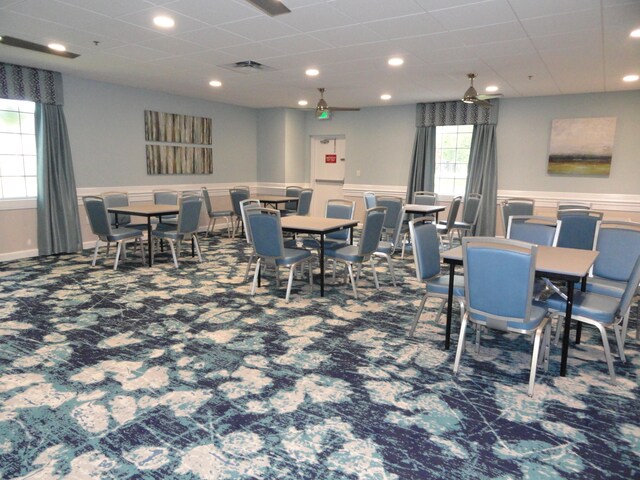 view of carpeted dining area