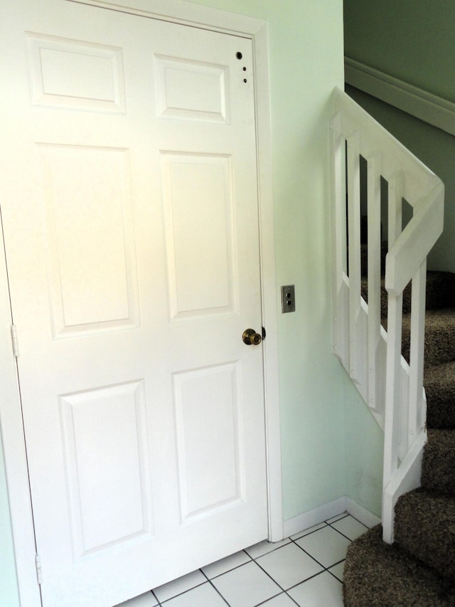 interior details featuring tile patterned floors