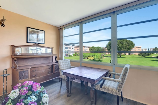 living area with hardwood / wood-style flooring