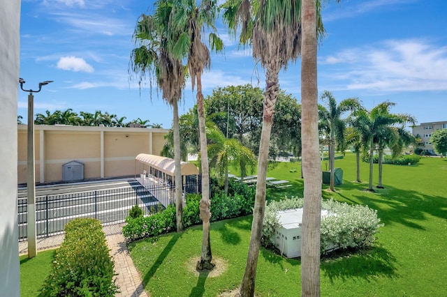 view of home's community featuring a yard