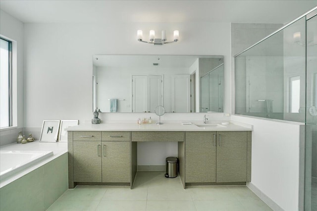 bathroom featuring vanity, separate shower and tub, and tile patterned floors