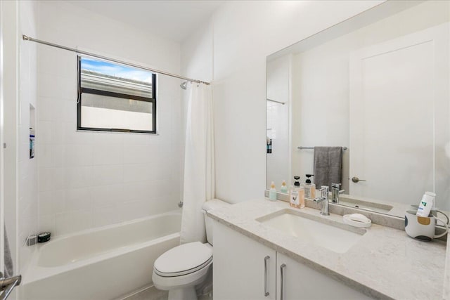 full bathroom featuring vanity, shower / bathtub combination with curtain, and toilet