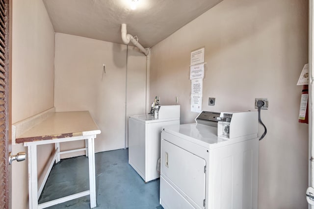 washroom featuring separate washer and dryer