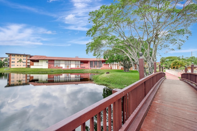 exterior space with a yard and a water view