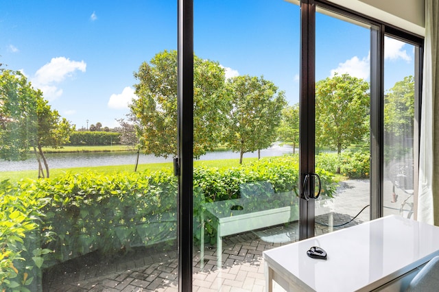 entryway featuring a water view