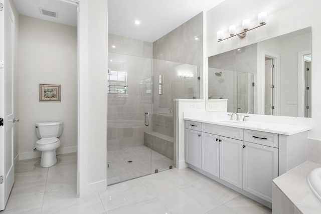 full bathroom featuring vanity, toilet, and independent shower and bath