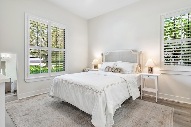 bedroom featuring hardwood / wood-style flooring