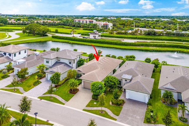 drone / aerial view with a water view