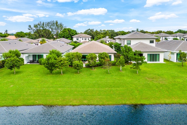 drone / aerial view featuring a water view