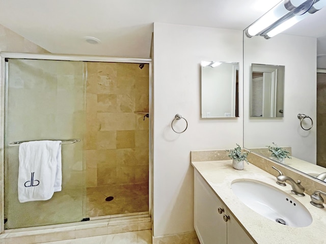 bathroom featuring vanity and walk in shower