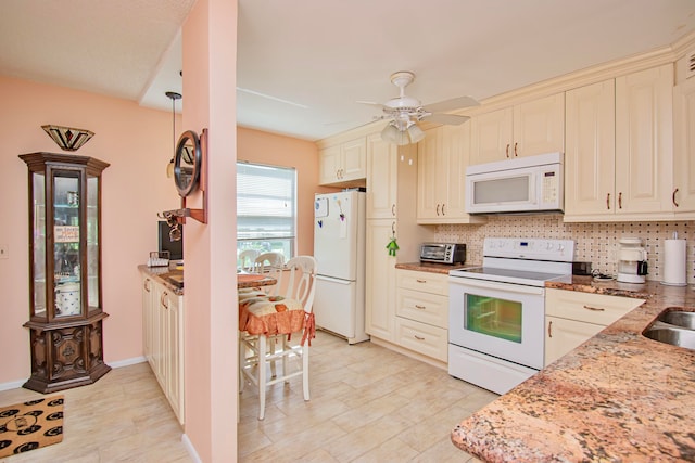 kitchen featuring white appliances, backsplash, decorative light fixtures, light stone countertops, and ceiling fan