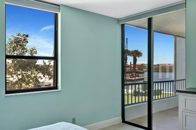 bedroom with light hardwood / wood-style flooring