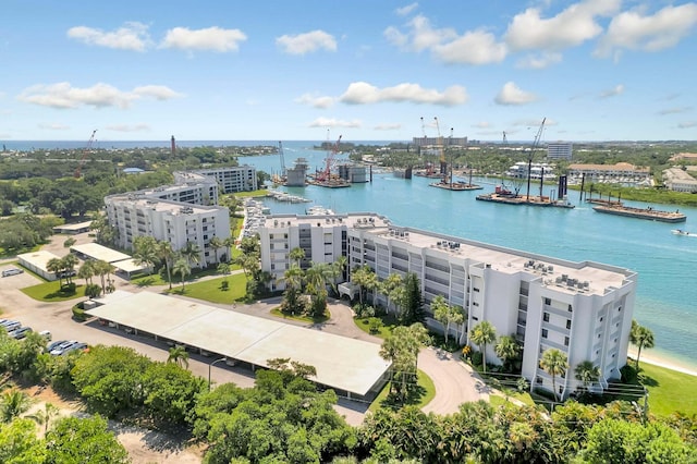 birds eye view of property featuring a water view