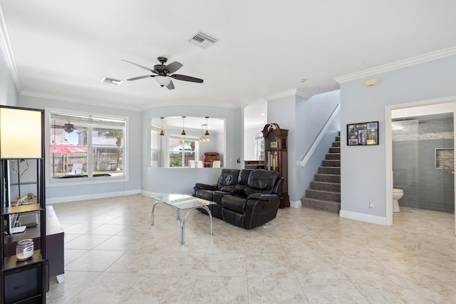 sitting room with light tile patterned floors, ceiling fan, and ornamental molding