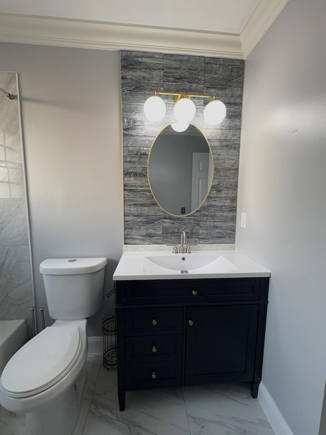 bathroom with toilet, vanity, tile walls, and ornamental molding