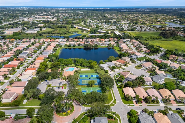 drone / aerial view with a water view