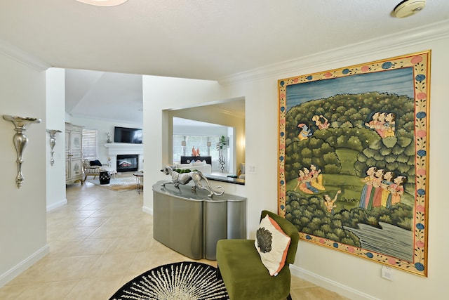 hall with crown molding and light tile patterned floors