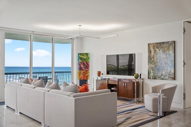 living room with floor to ceiling windows