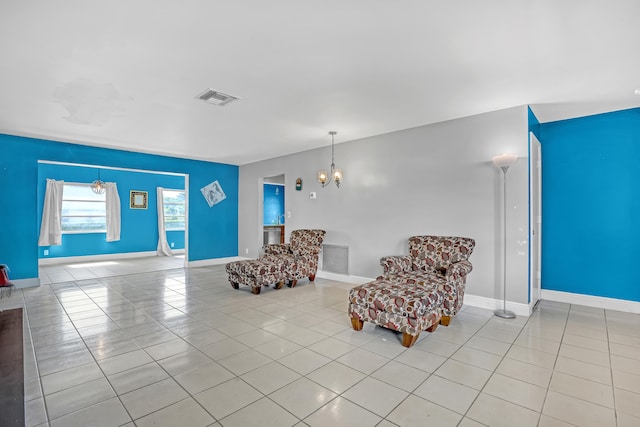 sitting room featuring light tile patterned flooring