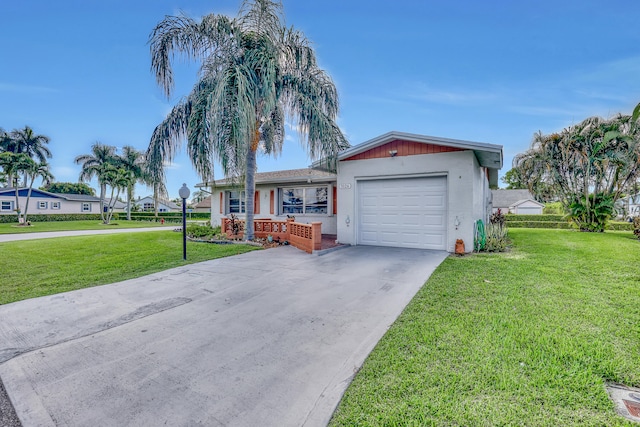 single story home featuring a garage and a front yard