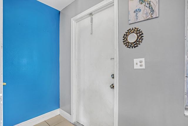 interior space featuring light tile patterned floors