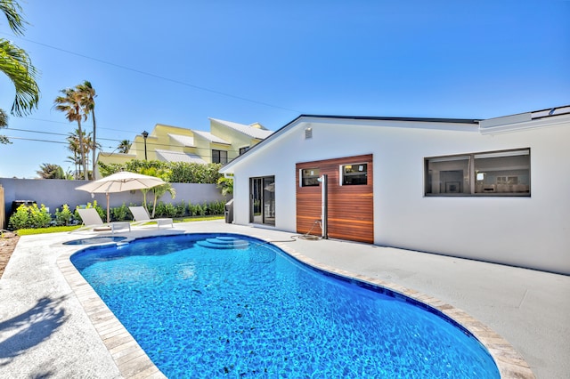 view of pool with a patio