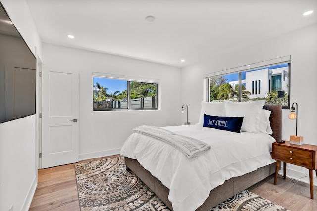 bedroom featuring light wood-type flooring